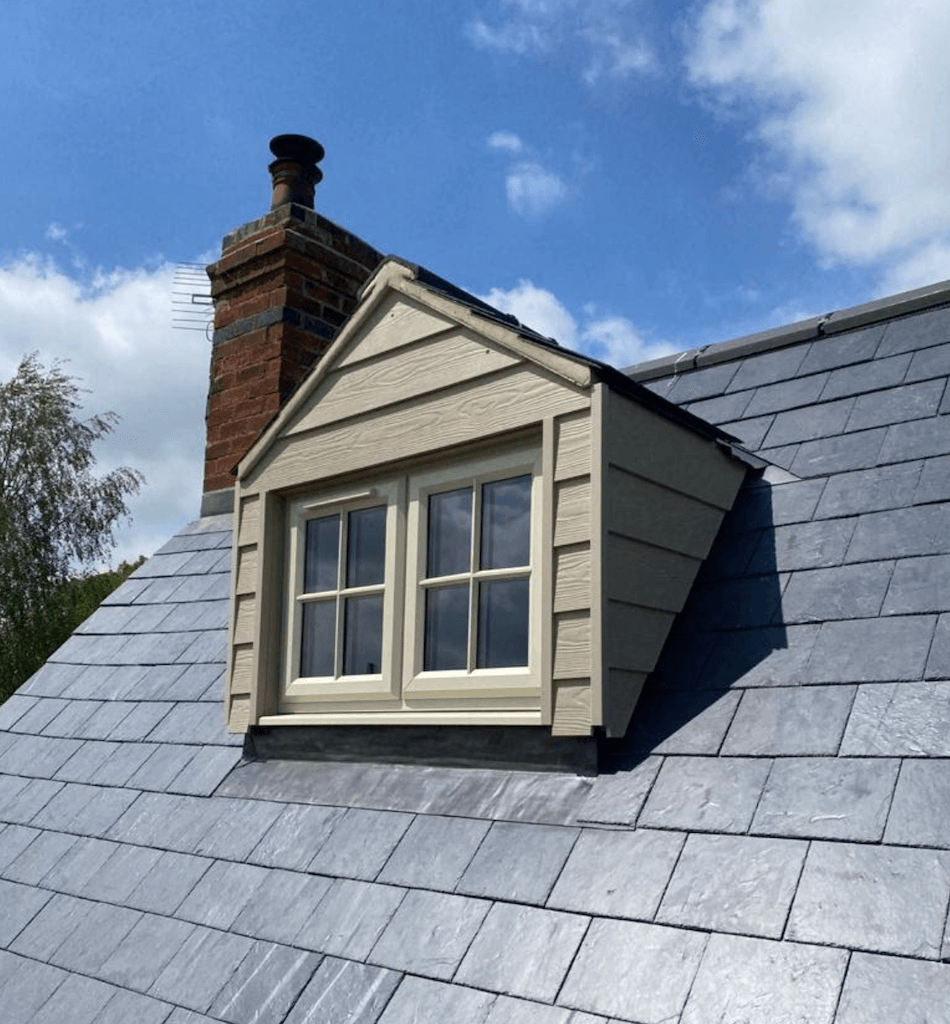 Converting flat roof to pitched roof