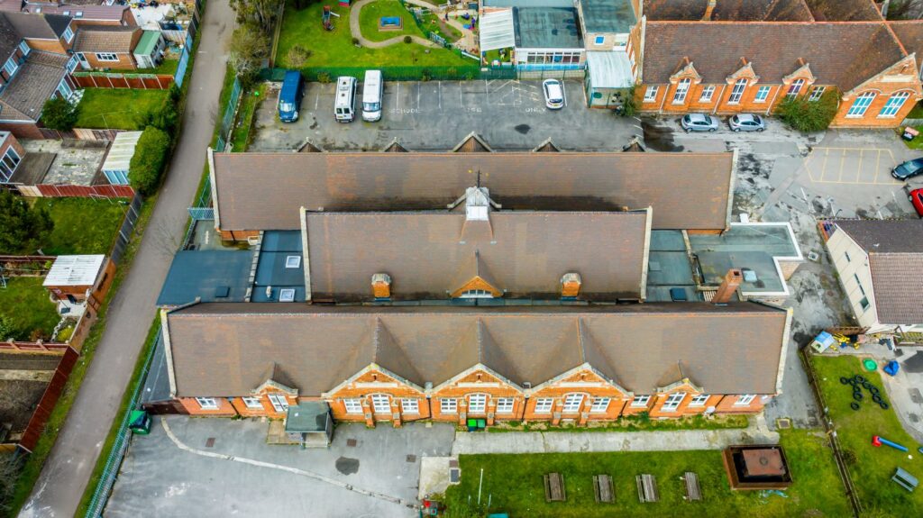 drone image of a large properties new roof