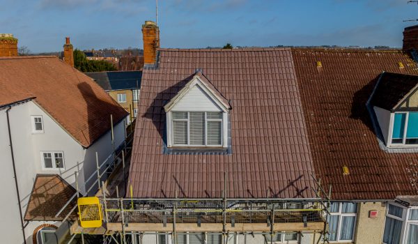 drone image of a roof being fixed on a domestic house